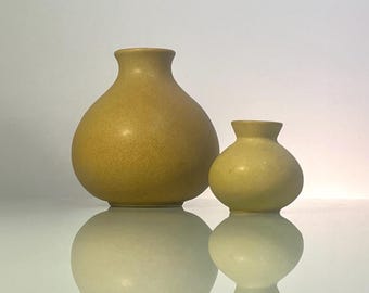 Pair of Modernist ceramic weed pot vases in matte mustard color