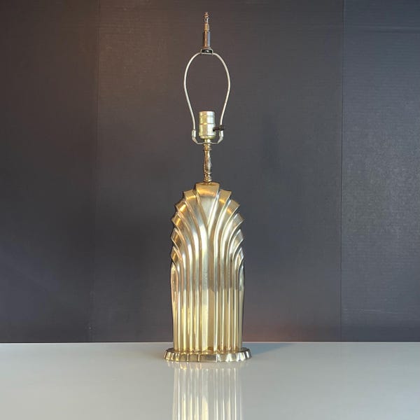 Vintage Art Deco lamp in brass resembling a skyscraper