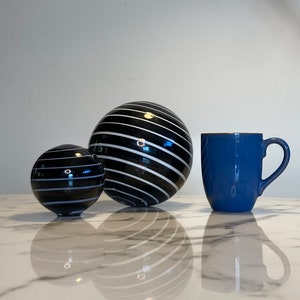 Set of two handmade striped globe table decorations in striped black and white glass image 7