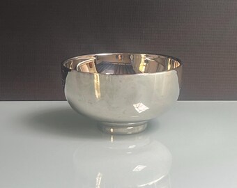 Decorative small double walled polished stainless steel bowl