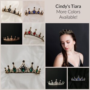 May include: Gold tiara with various colored gemstones, including red, blue, green, and black. The tiara is shown on a white background and on a model's head. "Cindy's Tiara More Colors Available!" is written in the image.
