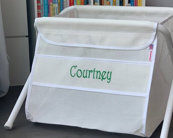 Personalized kid's toy box. Safe. Large capacity. And portable -easily take it anywhere. Made in the USA. White mesh with white canvas band.