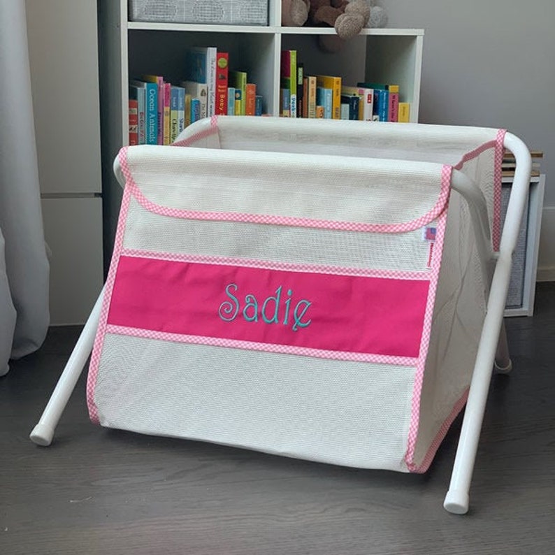 Personalized kid's toy box. Safe. Large capacity. Portable easily goes anywhere. Made in the USA. White mesh/pink panel/pink check binding. image 1