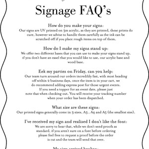 May include: A white text document with a black border and rounded corners. The document contains a list of frequently asked questions about signage, including information about how the signs are made, how to make them stand up, and what sizes are available. The document also includes information about shipping and returns.