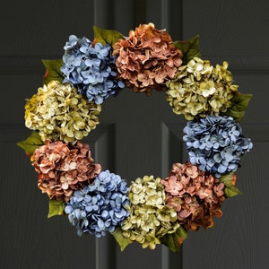 hydrangea wreath on black door