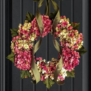 pink hydrangea wreath on a front door