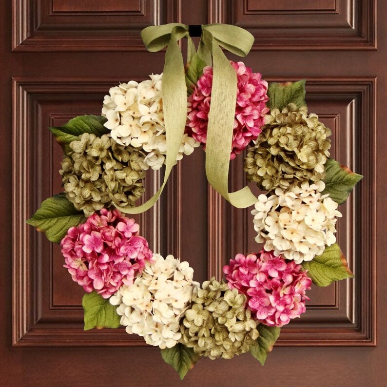 spring hydrangea wreath on a wood door