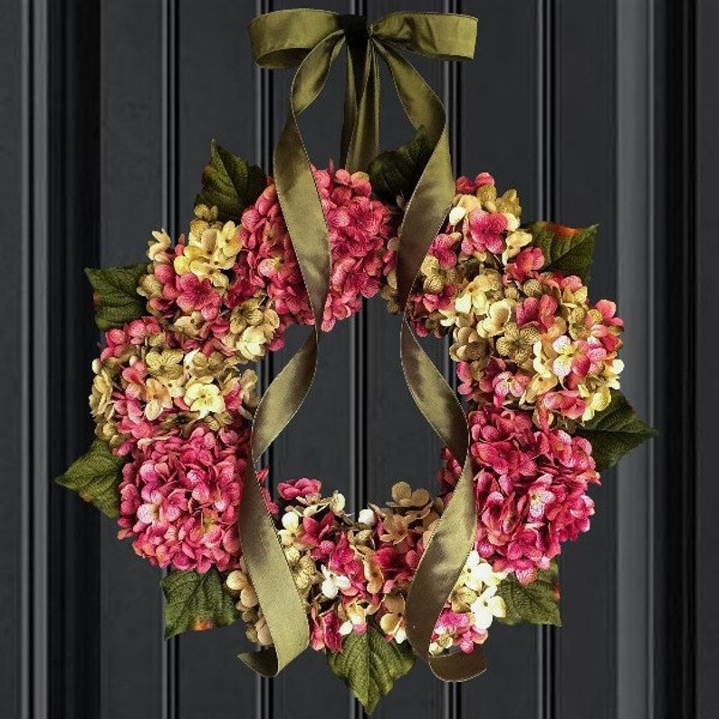 pink spring hydrangea wreath on a front door