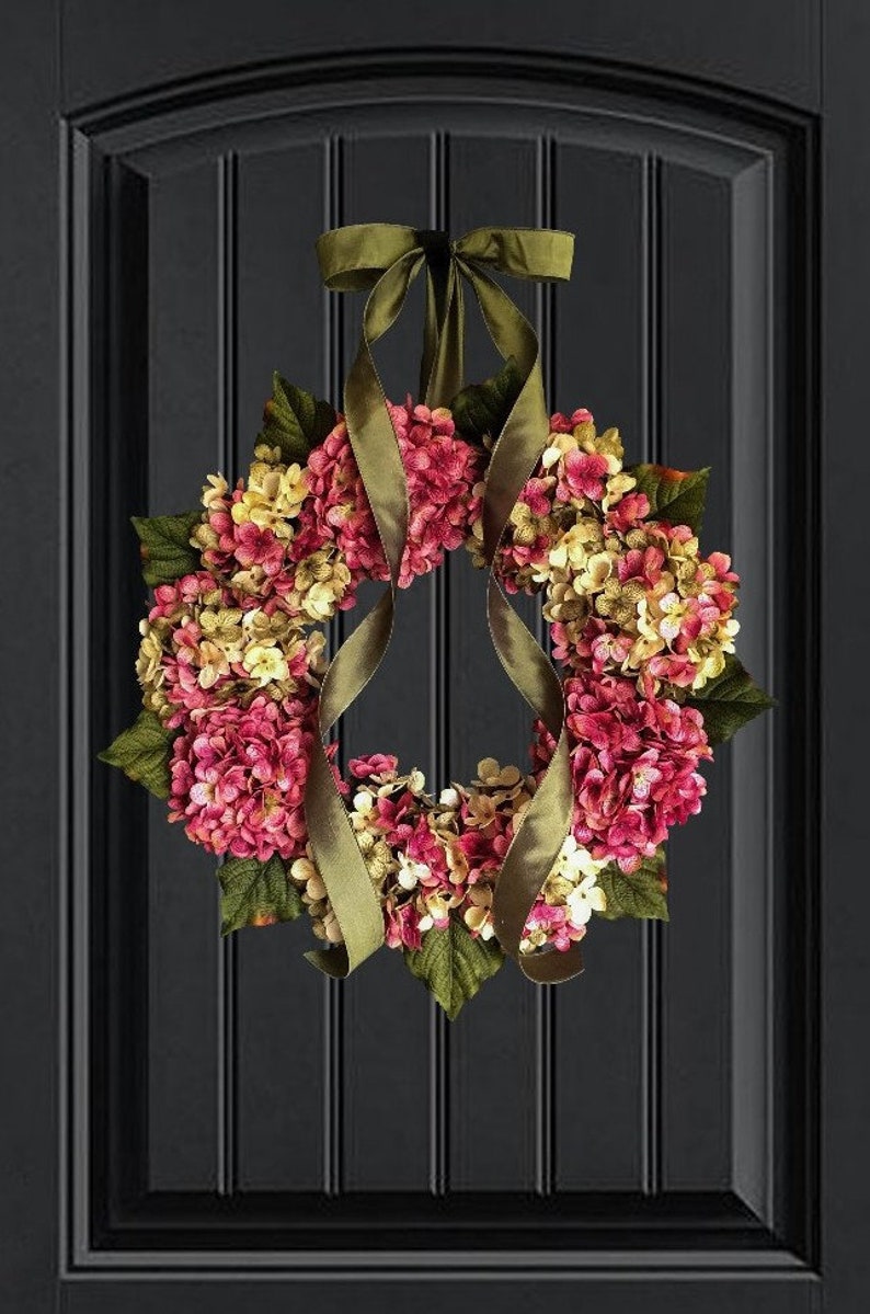 pink hydrangea wreath on a front door