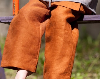 Linen trousers with a hanging pocket for kids. Wide leg natural children's pants. Many colors and sizes