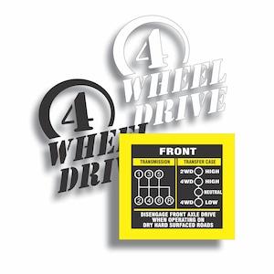 May include: White background with three decals. Two decals read "4 WHEEL DRIVE" in white and black. A yellow and black sticker shows a transmission diagram and text: "FRONT", "TRANSMISSION", "TRANSFER CASE", and "DISENGAGE FRONT AXLE DRIVE".
