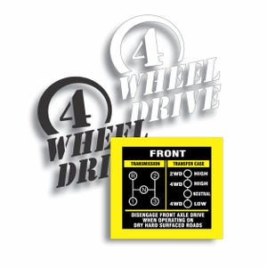 May include: White and black 4 Wheel Drive decals with a yellow and black sticker. The sticker shows a diagram of a transmission and transfer case with text that reads "FRONT". The text also reads "DISENGAGE FRONT AXLE DRIVE WHEN OPERATING ON DRY HARD SURFACED ROADS."