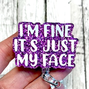 May include: Purple glitter badge holder with a white text overlay that reads "I'm fine it's just my face".