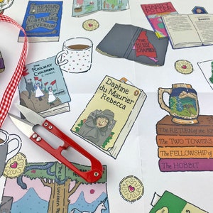 May include: A white background with colorful illustrations of books, mugs, and biscuits. The books include titles like "Treasure Island", "The Railway Children", "The Hobbit", and "The Blidly Chamber".