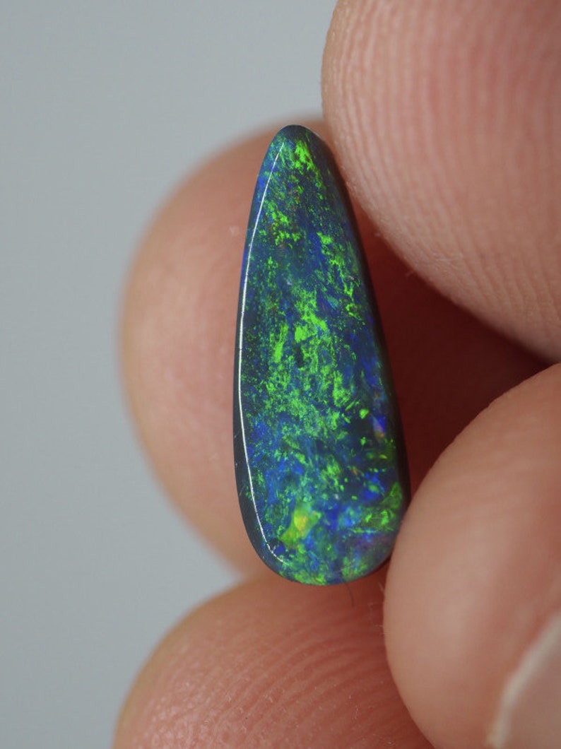 A smallish but very lovely piece of black opal from the opalfields of Lightning Ridge New South Wales Australia