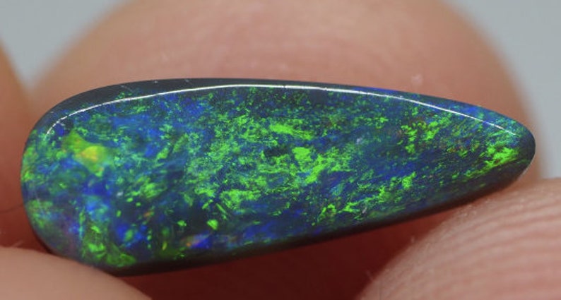 A smallish but very lovely piece of black opal from the opalfields of Lightning Ridge New South Wales Australia