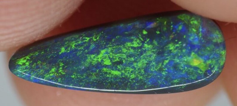 A smallish but very lovely piece of black opal from the opalfields of Lightning Ridge New South Wales Australia