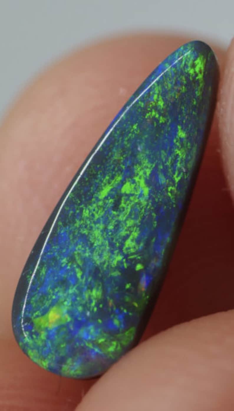 A smallish but very lovely piece of black opal from the opalfields of Lightning Ridge New South Wales Australia