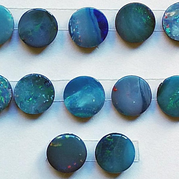 Good colour 7 mm round shape doublet opals