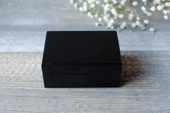 small black wooden box