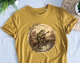 Cottagecore Aesthetic Frog playing instrument on a log shirt, Organic, unisex, frog T-shirt, Cottage core clothing, frog and toad,fairy core