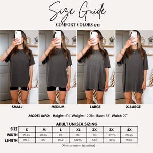 May include: A size guide for Comfort Colors 1717 t-shirts, displaying four images of the same charcoal grey shirt in sizes small, medium, large, and extra-large. Includes a table with adult unisex sizing in inches for width and length.