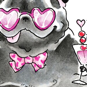 May include: A black pug wearing pink heart-shaped sunglasses and a pink bow tie with white hearts. The pug is looking to the right and has its tongue sticking out. The pug is holding a pink martini glass with a cherry on top.