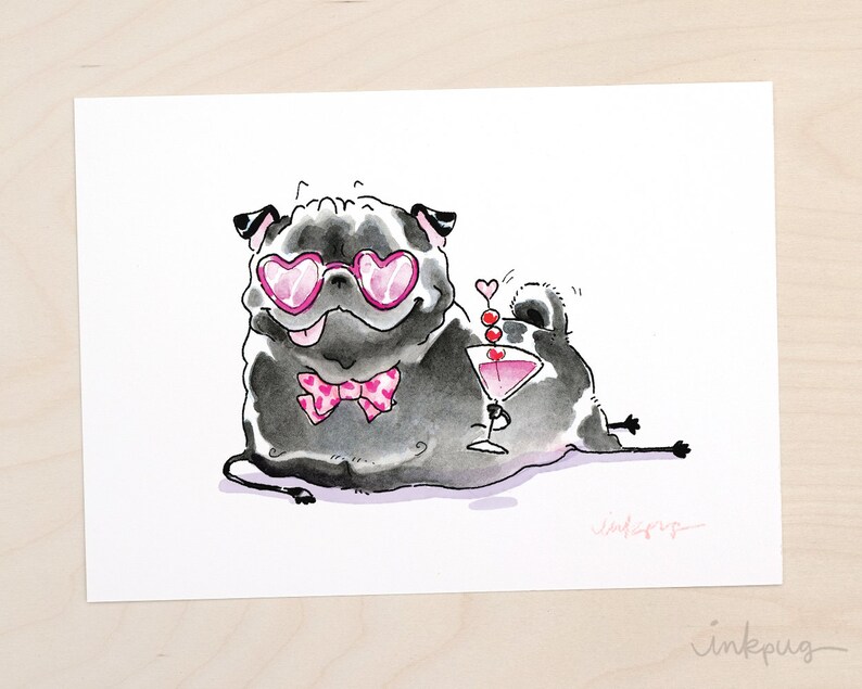 May include: A black pug wearing pink heart-shaped sunglasses and a pink bow tie, holding a martini glass with a cherry garnish. The pug is sitting on a white background.