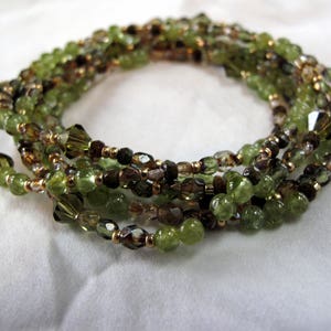 Peridot bead and gold multi-wrap seed bead and Swarovski crystal stretch bracelet/necklace