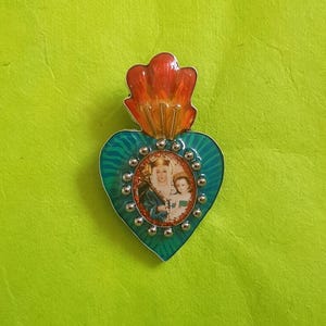 Spilla Milagro