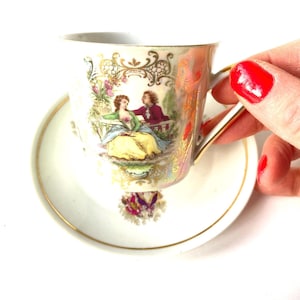 Teacup and saucer unique romantic iridescent cup COURTING COUPLE mismatched saucer and cup vintage porcelain by SophieLDesign