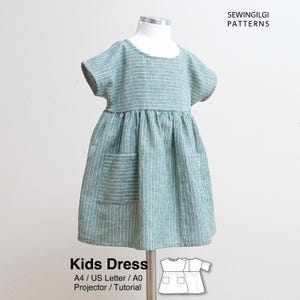 May include: A sage green dress with white vertical stripes, short sleeves, a round neckline, and two front patch pockets. The text SEWINGILGI PATTERNS and Kids Dress A4 / US Letter / A0 Projector / Tutorial is visible with a line drawing of the dress.