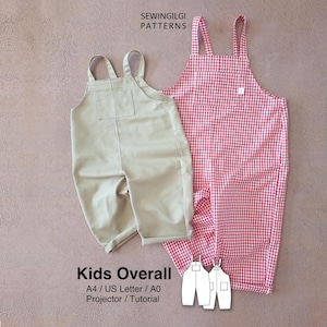 May include: Two children's dungarees. One is a plain beige colour, and the other is red and white gingham. The dungarees have adjustable straps and pockets. The text "Kids Overall" is at the bottom of the image, along with other text.