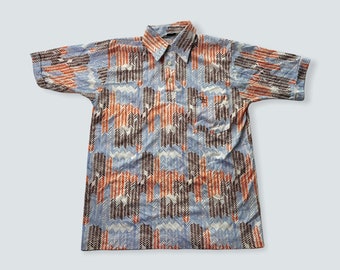 Vintage grand slam by munsingwear  penguin all over print 1970s disco 70s disco polyester shirt print inspiration