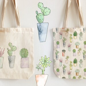 May include: Three tote bags with different cactus and succulent designs. The first bag features three potted plants, a pink succulent, a green cactus, and a spiky green cactus. The second bag has a single potted cactus with green leaves. The third bag has a repeating pattern of various potted cacti and succulents.