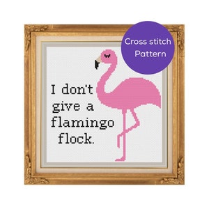 May include: Cross stitch pattern featuring a pink flamingo with the text "I don't give a flamingo flock."