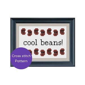 May include: Framed cross-stitch art featuring the phrase "cool beans!" in black letters. The design includes rows of brown beans with sunglasses. A purple circle with the text "Cross stitch Pattern" is in the lower left corner.
