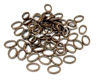 50 piezas de anillos de enlace ovalados de cobre antiguo con conectores abiertos (n.° 684B)