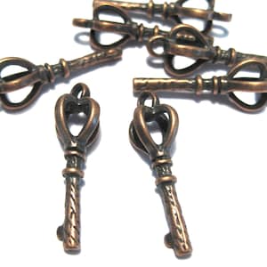10 colgantes de llave 3D chapados en cobre antiguo de 26 mm (n.° CPCM636)