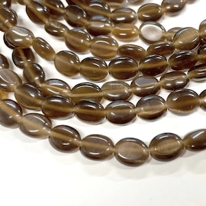 1 Strand (40pcs) of Brown Glass Cats Eye Beads 10mm Flat Oval Glass Beads(No.GC1621)