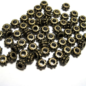 50pcs of Antique Bronze Spacer Beads 4mmx3mm(No.BZSP546)