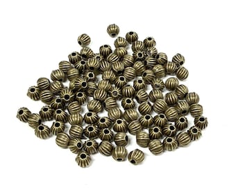 100 Stück Antik Bronze Runde gewellte Spacer Perlen (No.550)