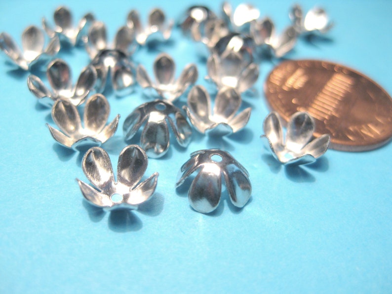 100pcs of Flower Bead Caps Silver Tone 8x4mmNo. BCP398 image 1