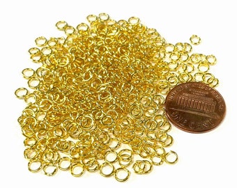 5  Grams of Gold Plated Open Jump Rings 4mm 21ga (No.GR2349)