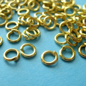 100pcs of Gold Tone Plated  Open Jump Rings 5mm 18ga( No.977)