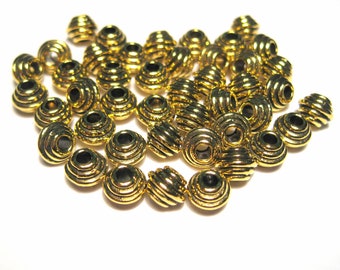 30pcs of Antique Gold Spacers Beads 4x6mm(No. GSB1126)