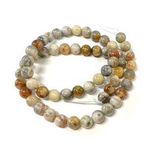 1 sznur naturalnych koralików z agatu szalonego o średnicy 6 mm (nr GS1684A)
