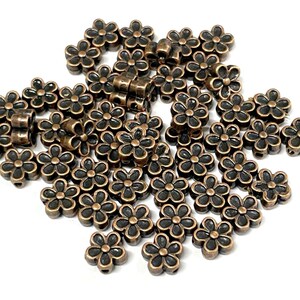 50pcs of Antique Copper Flower Spacer Beads Double Sided(No. CSP2203)