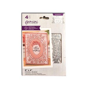 May include: A Gemini die set featuring a decorative rose frame and a card with an oval rose design. The card measures 6" x 4" (15.2cm x 10.2cm) and has the text "Expect nothing, appreciate everything!"