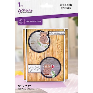 May include: Embossing folder with wooden panels, featuring two circular cutouts with owl illustrations. The owls are perched on branches, with text that reads "You're twit twoo kind" and "I'm OWL yours". The folder measures 5" x 7.1".